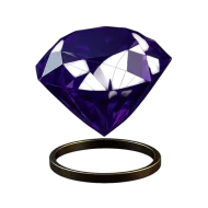 Paarse geslepen edelsteen naast een gouden ring